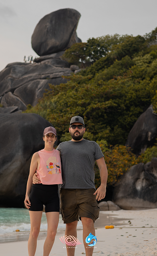 Visitors at the Sail Rock viewpoint boulder, Similan Island